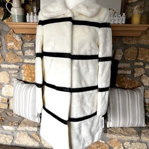 New with tags. Extra small faux fur coat.